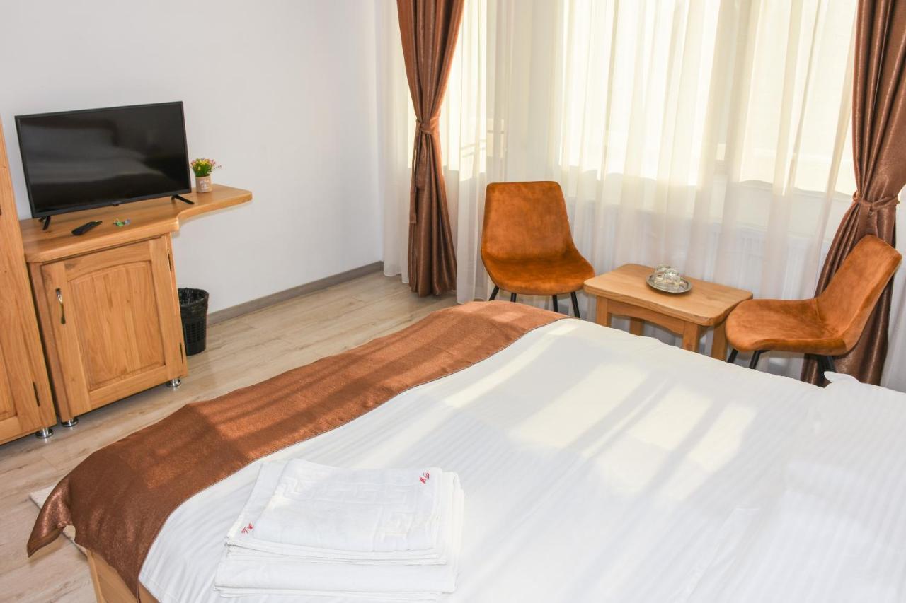 Отель Tomis House Куртя-де-Арджеш Экстерьер фото